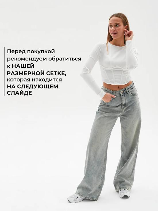 Потёртые джинсы-багги.